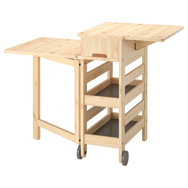 A RESARÖ light wooden cart with foldable tables. It has shelves for storage and wheels for mobility.