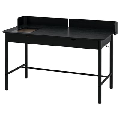Black RIDSPÖ desk with glass drawer, cable management, shield, and angled legs.