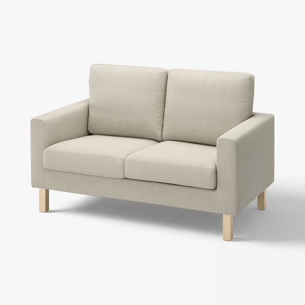 A beige SALTSJÖBADEN loveseat with wooden legs. It has a simple, clean design with supportive cushions.