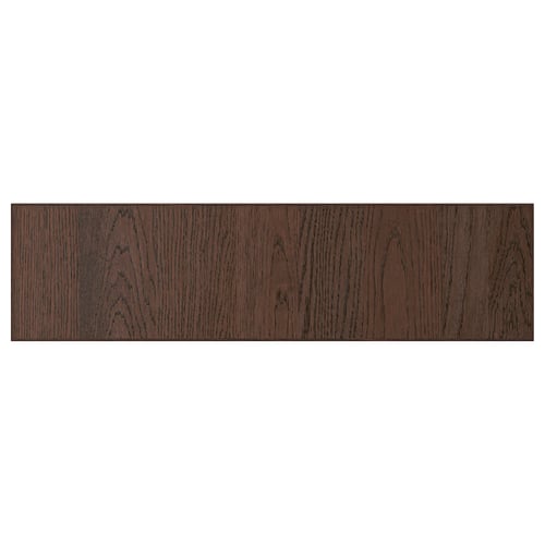 Dark wood panel, rectangular with a smooth edge, likely part of kitchen cabinetry.