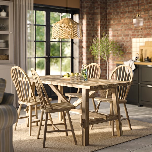 Acacia wood dining set, table & 6 chairs, rustic modern, window background.