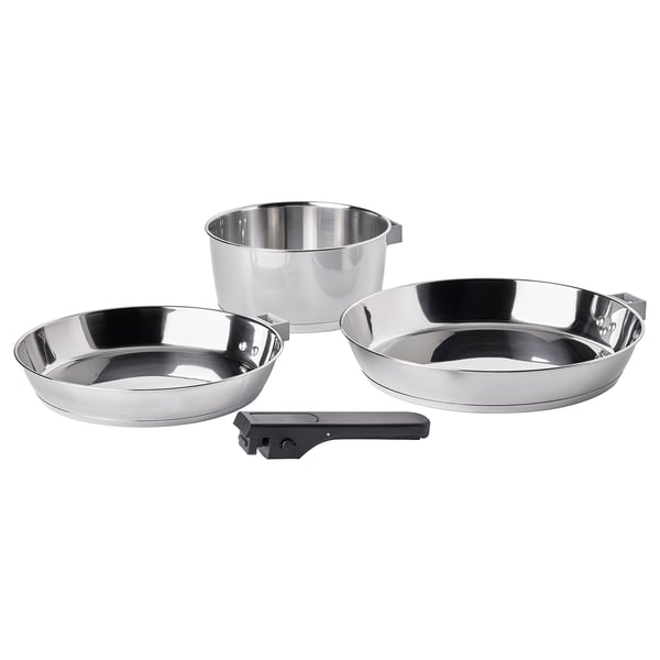Stainless steel SLÄTROCKA pots with removable handles for easy storage and versatile cooking.