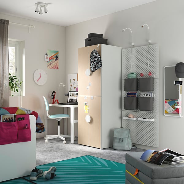 Modern teen bedroom with SMÅSTAD wardrobe, desk setup, pegboard, and colourful decor.