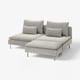 Modern light grey modular sofa with three seat cushions, metal legs, and four square pillows.