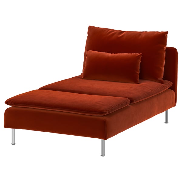 Orange, modern recliner chair with metallic legs, cosy, minimalist design.