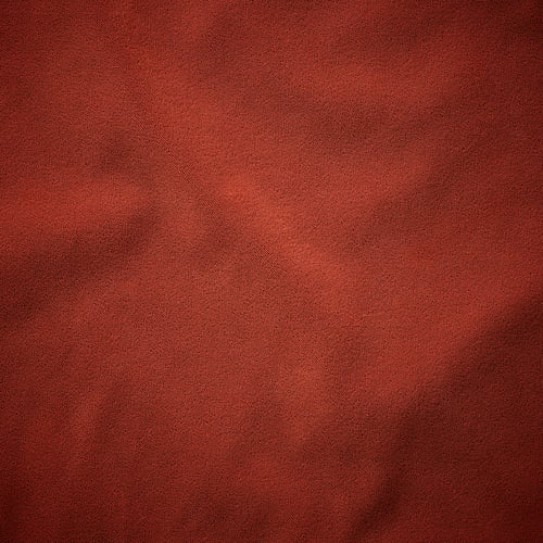 Rich brown recycled polyester fabric close-up, showcasing high-quality texture and intricate weave pattern.