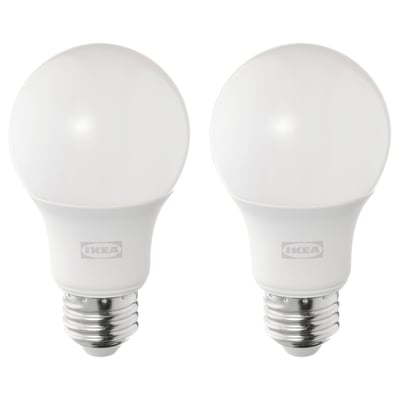 Two ikea led light bulbs, white, spherical shape, warm-white light, durable plastic and metal base.