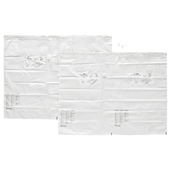 Three clear vacuum storage bags, white zippers, square bottom, used for packing, labelled SPANTAD.