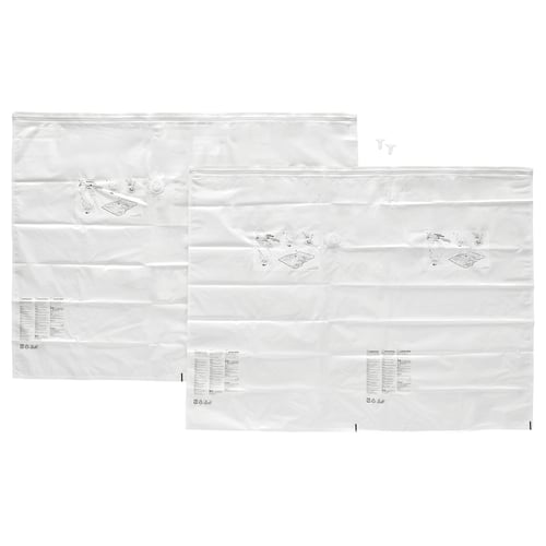 Three clear vacuum storage bags, white zippers, square bottom, used for packing, labelled SPANTAD.