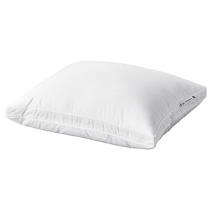 A white STRANDMOLKE pillow, rectangular, with soft dobby cotton weave, supportive inner core, and fluffy outer fill, featuring double piping detail.