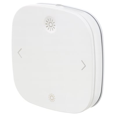 White rectangular remote control with symbols for sun and arrows for adjusting light. Made of abs plastic.