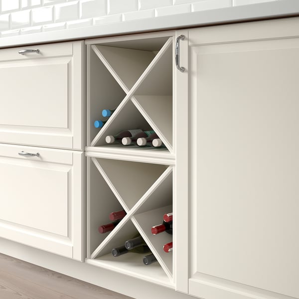 White kitchen cabinet with wine rack, holding bottles, integrated into cabinetry.