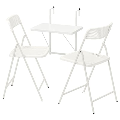 Caption: TORPARÖ set, white. Foldable outdoor table and chairs, minimalist design.
