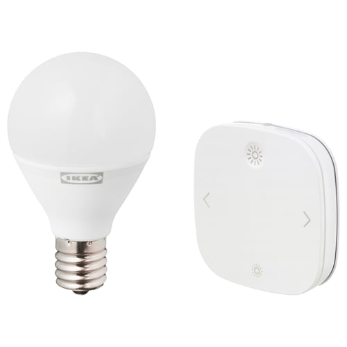 TRÅDFRI smart lighting products by IKEA: a white led bulb and a white remote control with light and dimming icons.