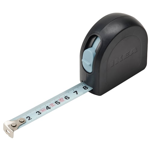 IKEAs black and grey TRIXIG tape measure, ergonomic, rubberized grip, steel tape, precise markings, nickel-plated hook, for diy.