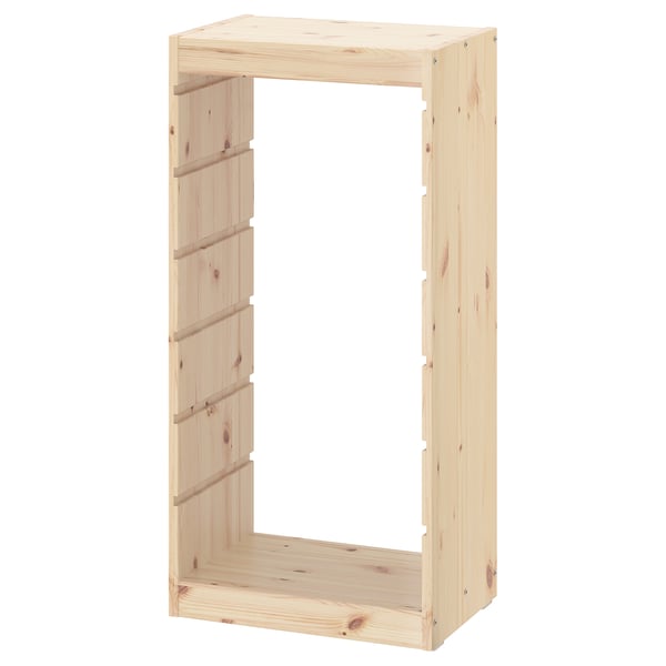 An ikea TROFAST light pine wooden storage frame, rectangular, for organizing childrens items.