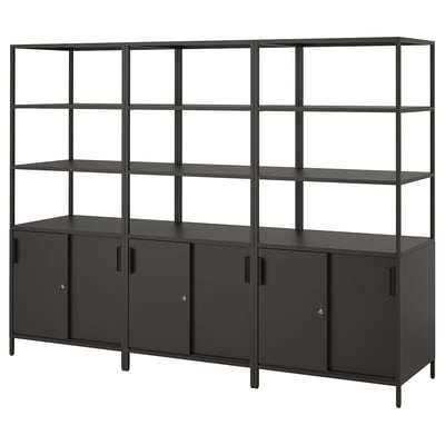 Modern black metal TROTTEN shelf unit with four cabinets and open shelves.