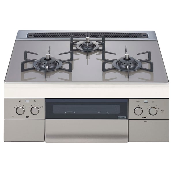 Stainless steel gas stove with silver control panel and four burners.