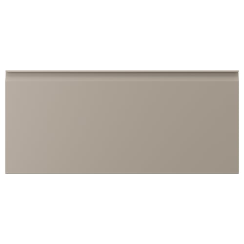 Displays a beige kitchen cabinet door with integrated handles and a sleek, modern design.
