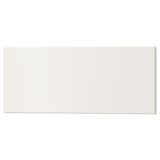 Displays a rectangular white UTRUSTA drawer front made of acrylic-painted fiberboard.
