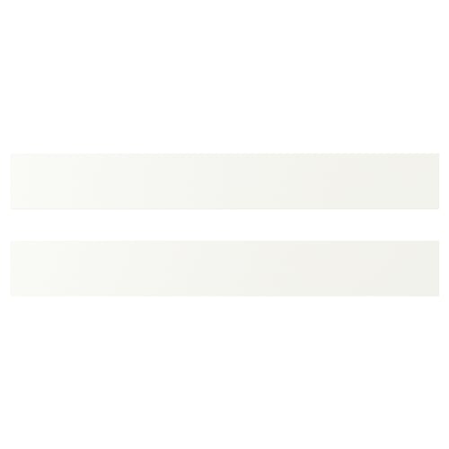 White VALLSTENA kitchen cabinets, smooth clean surface, particleboard material.