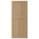 A VEDHAMN kitchen cabinet door in natural wood with a solid oak frame and panel design.