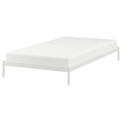 VEVELSTAD white metal bed frame, minimalist design, rectangular shape.
