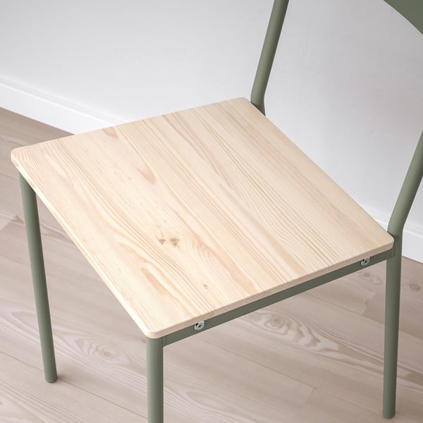 Small, modern side table with light wooden top and green metal legs. Minimalist, sturdy design.