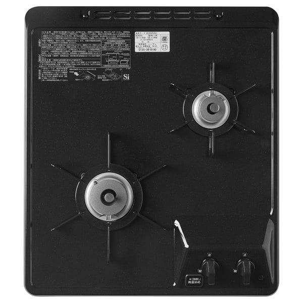 A black gas hob with two burners, knobs, and safety labels.
