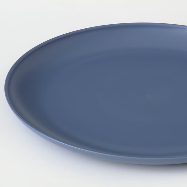 Smooth, blue plastic plate, durable and bpa-free.