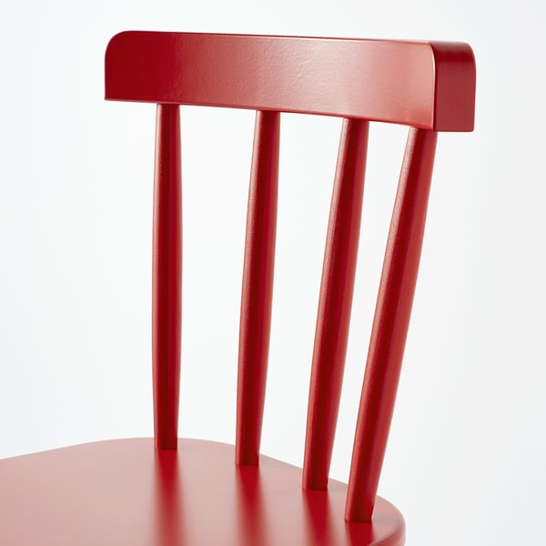 Bright red wooden junior chair. Quality paint, sturdy beech legs, simple, modern design.