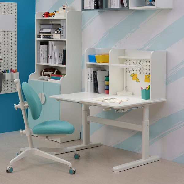 Adjustable white desk with pegboard, shelves, & accessories; larger than blue chair.