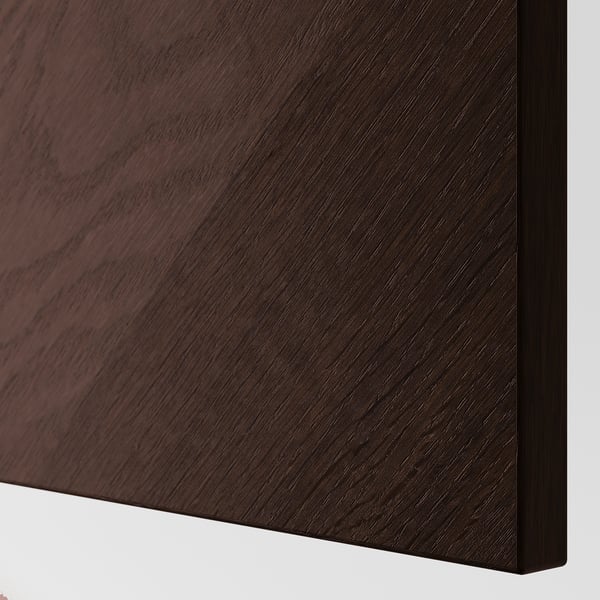 Dark wood-grained surface, smooth finish. Angled close-up showing texture and quality.