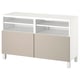 Modern BESTÅ tv stand, white with beige drawers, rectangular shape, sleek design.