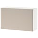 Beige BESTÅ storage cabinet, rectangular, plain surface, wall-mountable.