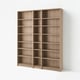 BILLY bookcase: light brown, wooden, rectangular; six adjustable shelves per section, two sections.