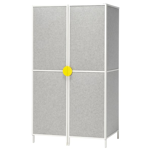 A BRÄNNBOLL grey gaming station with yellow accents, featuring a modern design with multiple compartments for storage.