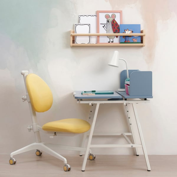 Yellow kids chair & desk with lamp, perfect for studying or playing.