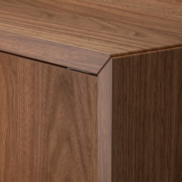 Close-up of smooth, high-quality wooden cabinet edge with sleek design.
