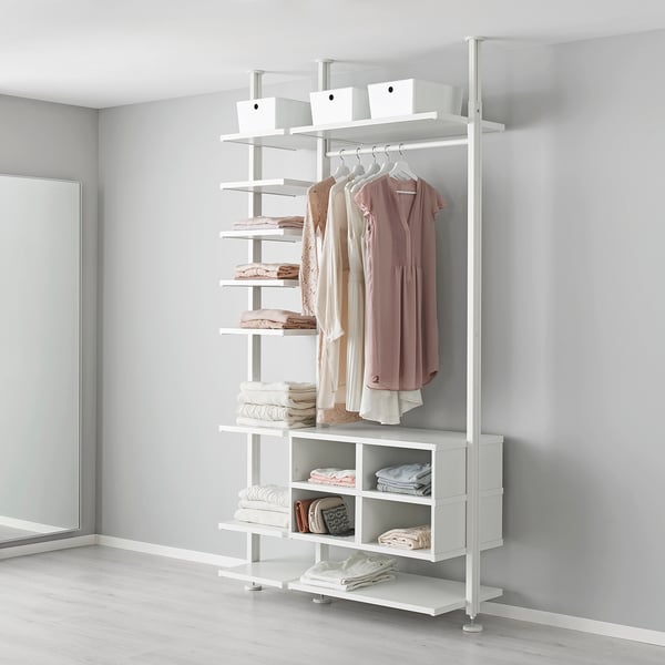 White ELVARLI clothing rack, storing clothes. Tall, organised, and minimalist design.