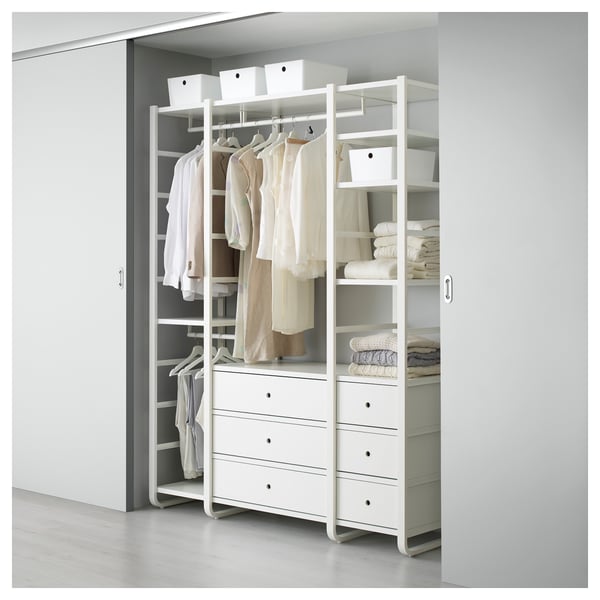 White ELVARLI storage system with drawers, shelves, and hanging space for clothes.