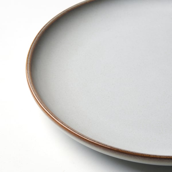 Elegant handcrafted plate, smooth, perfect for table settings.