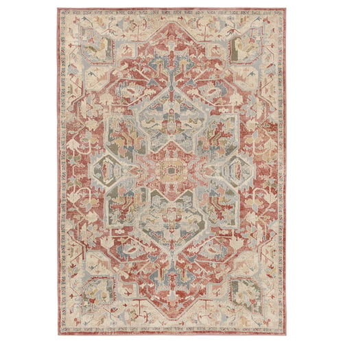 A red, beige, and blue JÄRNVÄG area rug with intricate patterns. Its rectangular and made from recycled materials.