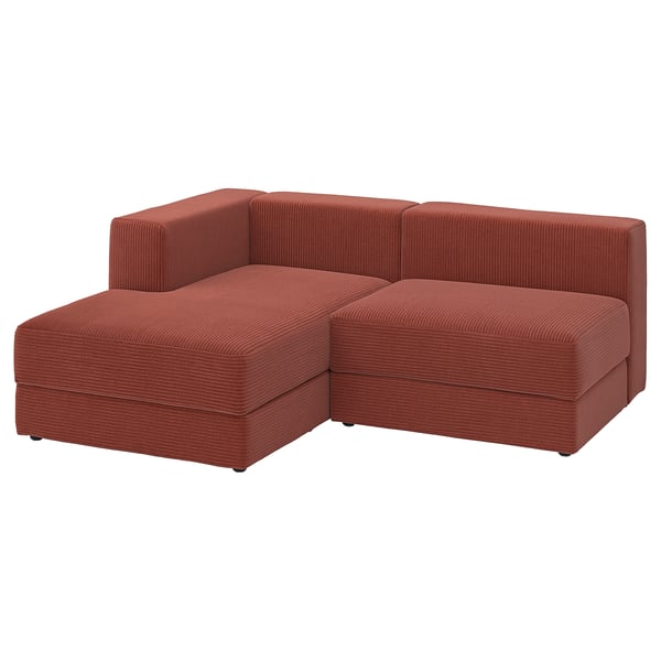 Reddish-orange modular sofa, sleek and modern. A chaise and storage seats, ideal for lounging and organisation.