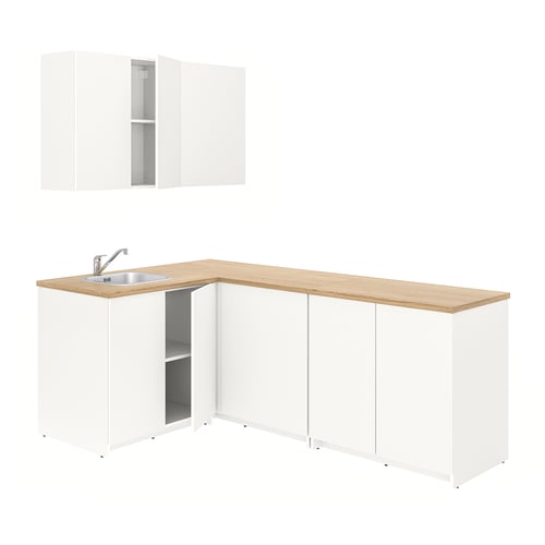 A white KNOXHULT kitchen set with light wood countertop and stainless steel sink.