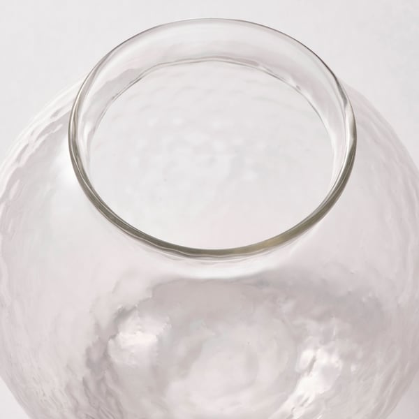 Clear, semi-transparent vase with textured, shimmering surface.