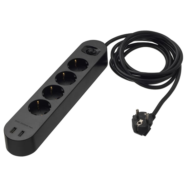 A black multi-plug socket with 4 outlets and 2 usb ports. Made of polycarbonate. Perfect for charging devices and saving energy.