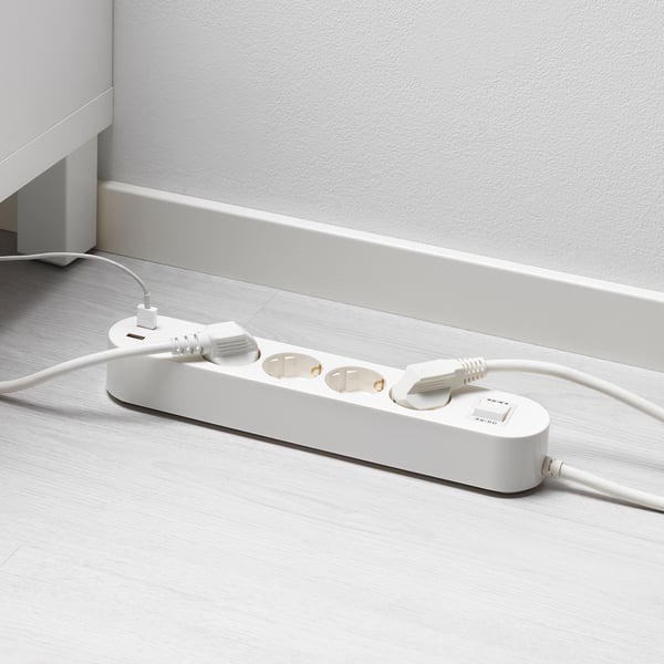 Wooden floor plug with 4 outlets & 2 usb ports.