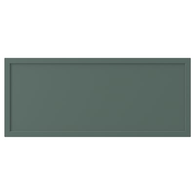 A rectangular green KRUKMAKARE unit. It a modern design with a smooth surface and framed edges.
