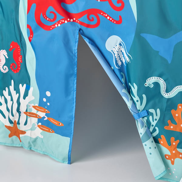 Clear tent vibrant ocean scene, securely fastened to bed frame, quality fabric.
